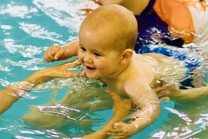 Baby smiling in the water