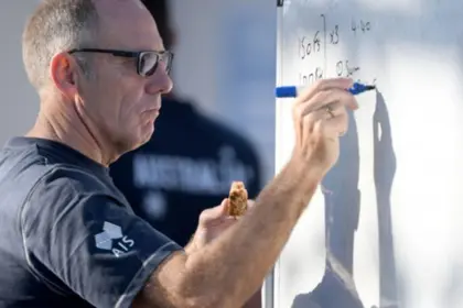 Chris Nesbit writing on whiteboard