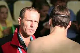 Chris Nesbit talking to a swimmer