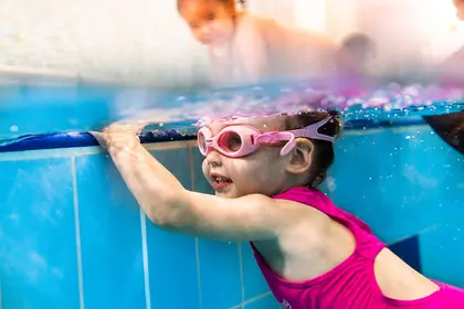 Young girl smiling underwater