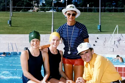 Forbes and Ursula Carlile with some students by the pool