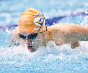Close-up shot of a competitive Carlile swimmer
