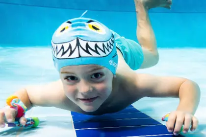 Young boy smiling underwater