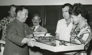 Ursula receiving a farewell gift after the visit to China