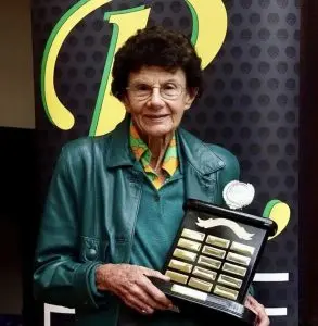 Ursula Carlile holding a trophy