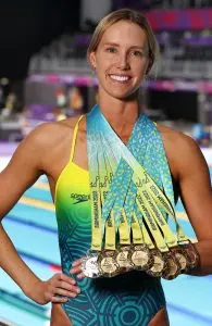 Emma McKeon posing with all her medals