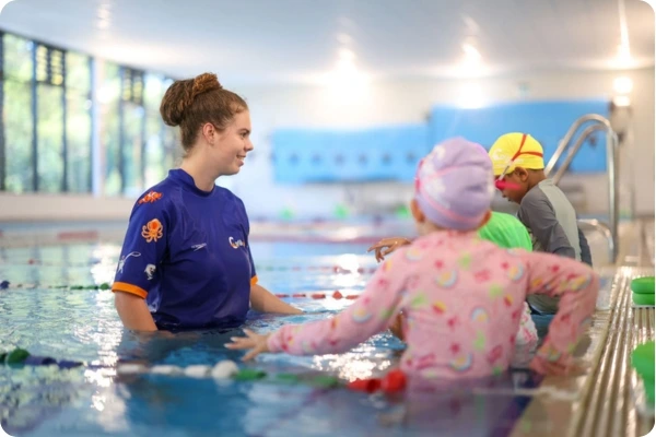 Carlile Swim teacher with children